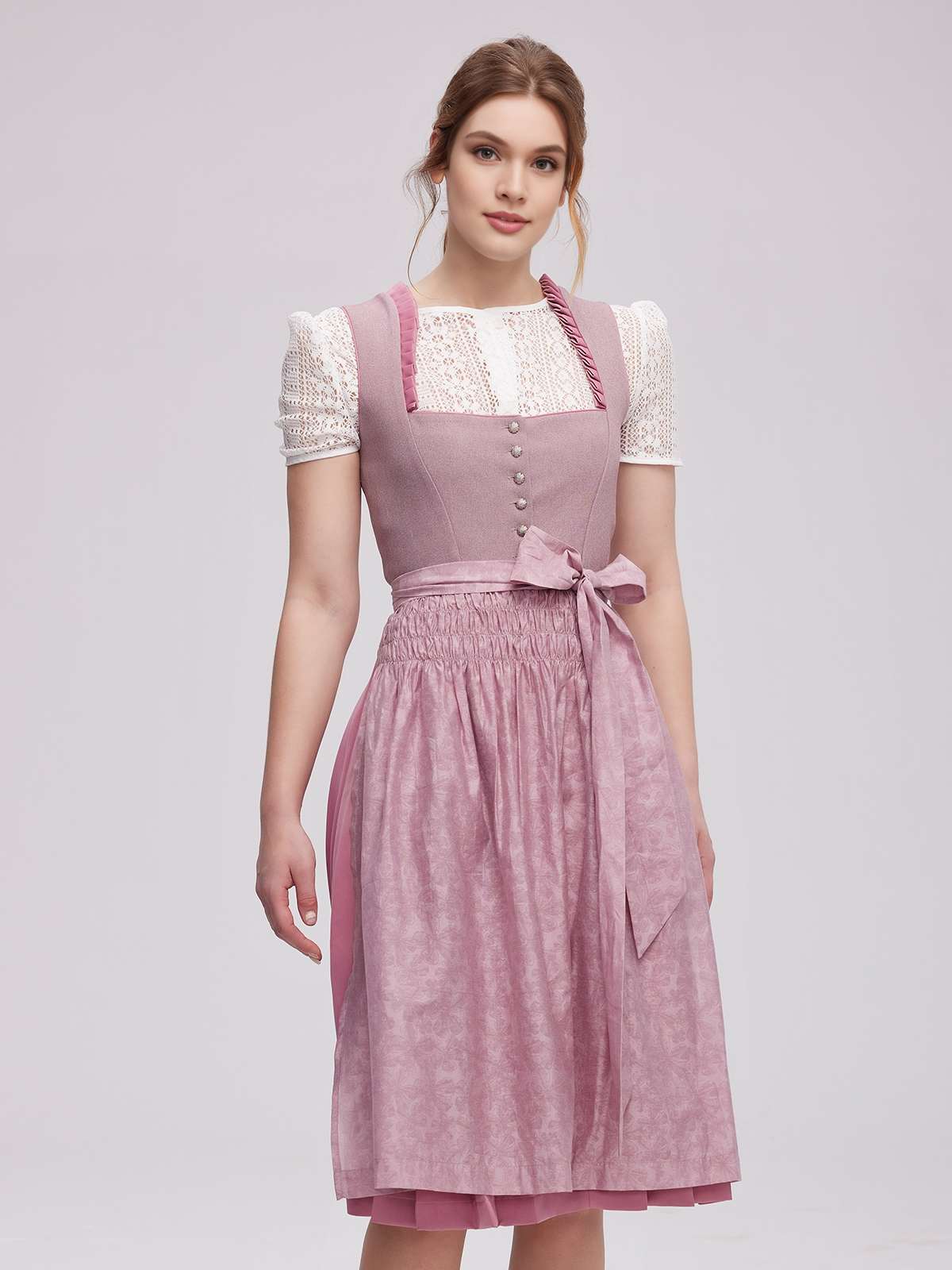 Lila Dirndl mit Samt-Details
